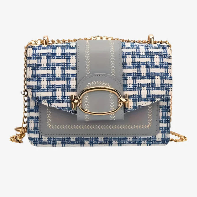 Handbag with blue and white pattern and gray accents, shown with measurements on a white background.