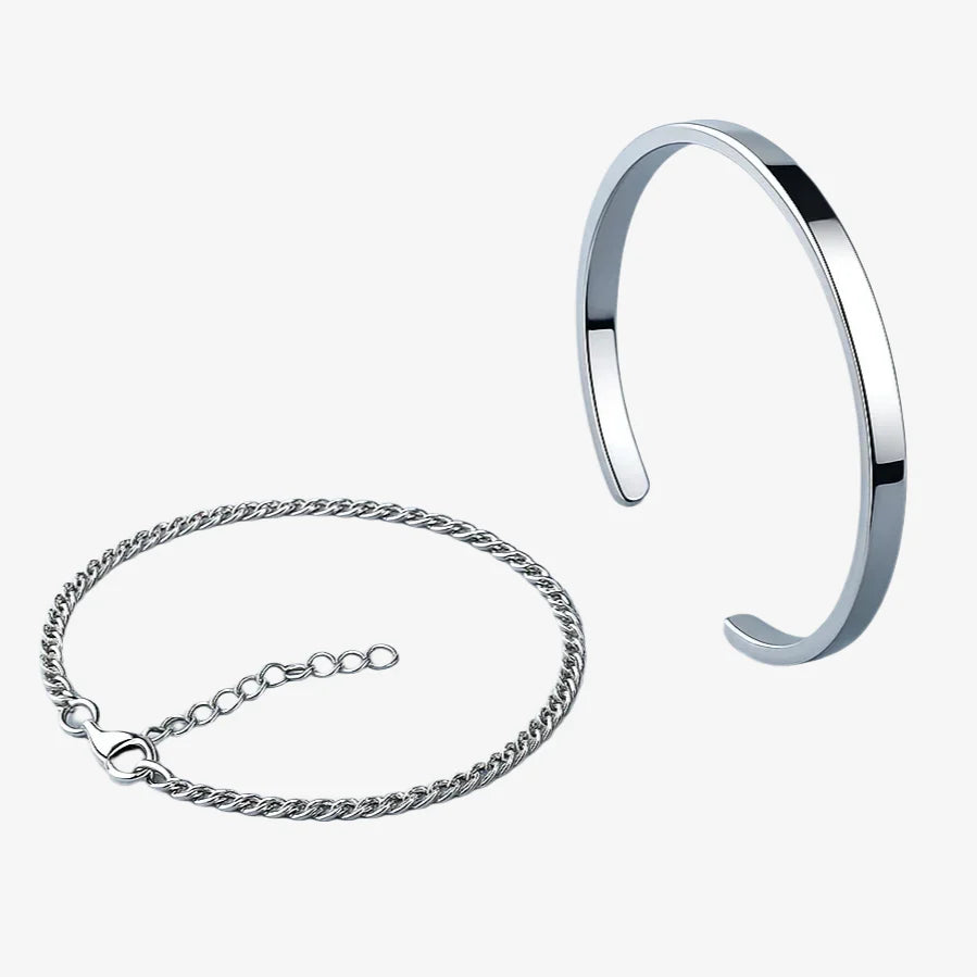 Silver bracelet and chain on a light blue background