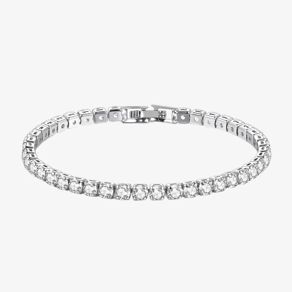 Silver bracelet with clear gemstones on a white background