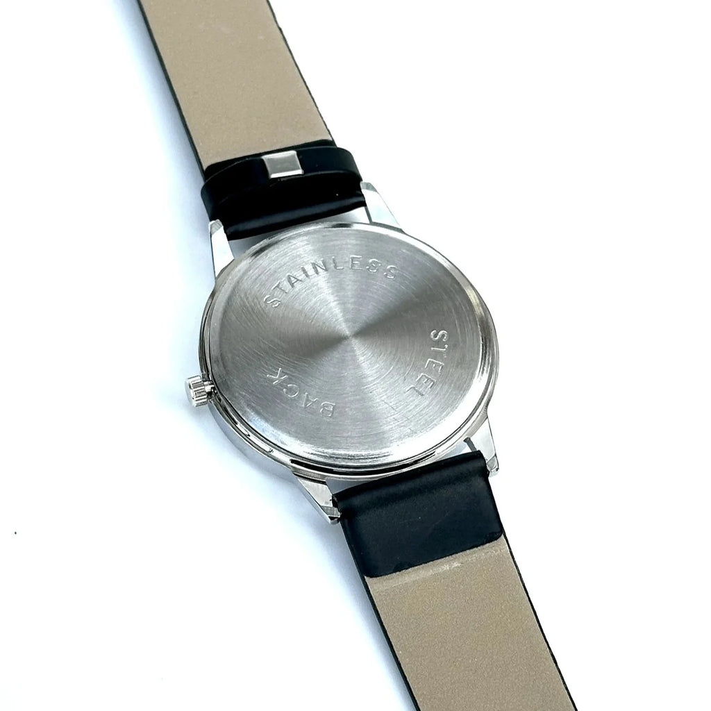 Wristwatch with black strap and silver case on a white background